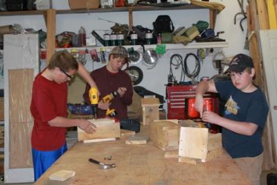 Members of the Get Outdoors Club built birdhouses to replace the old ones on the blueberry trails in 2011.